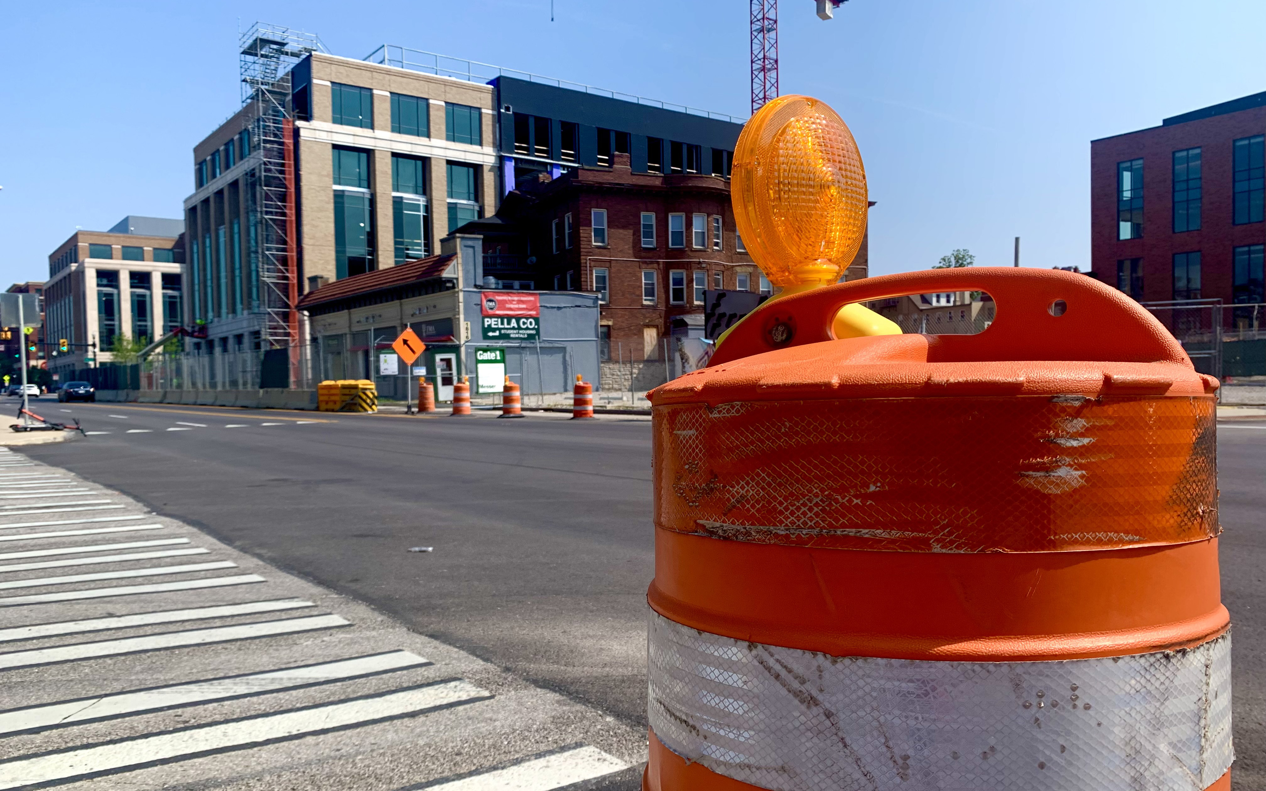 A view of a construction cone on the side of the road.