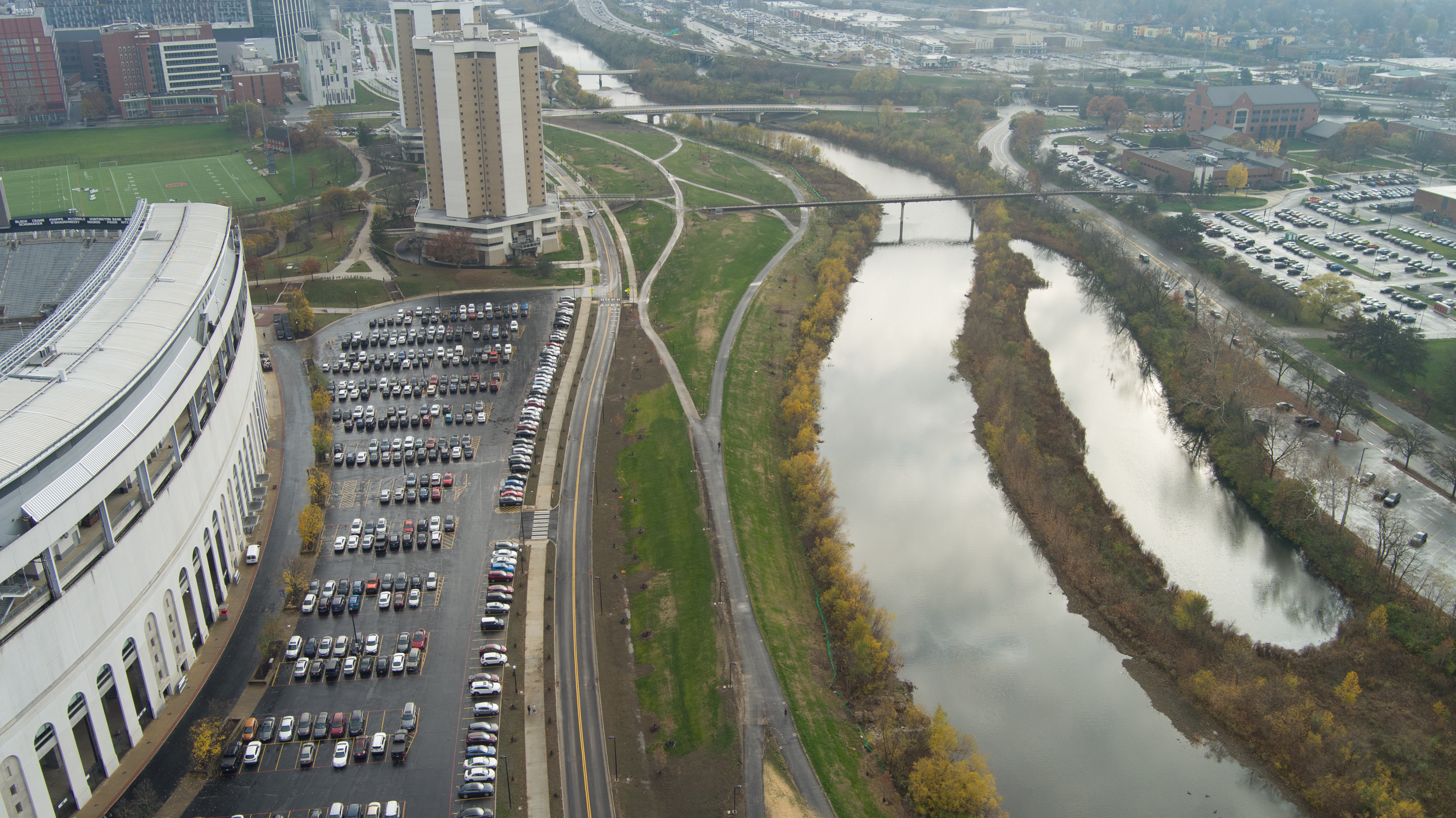 A bird's eye view of Cannon Drive. Ohio Stadium is on the left side and the river can be seen on the right.