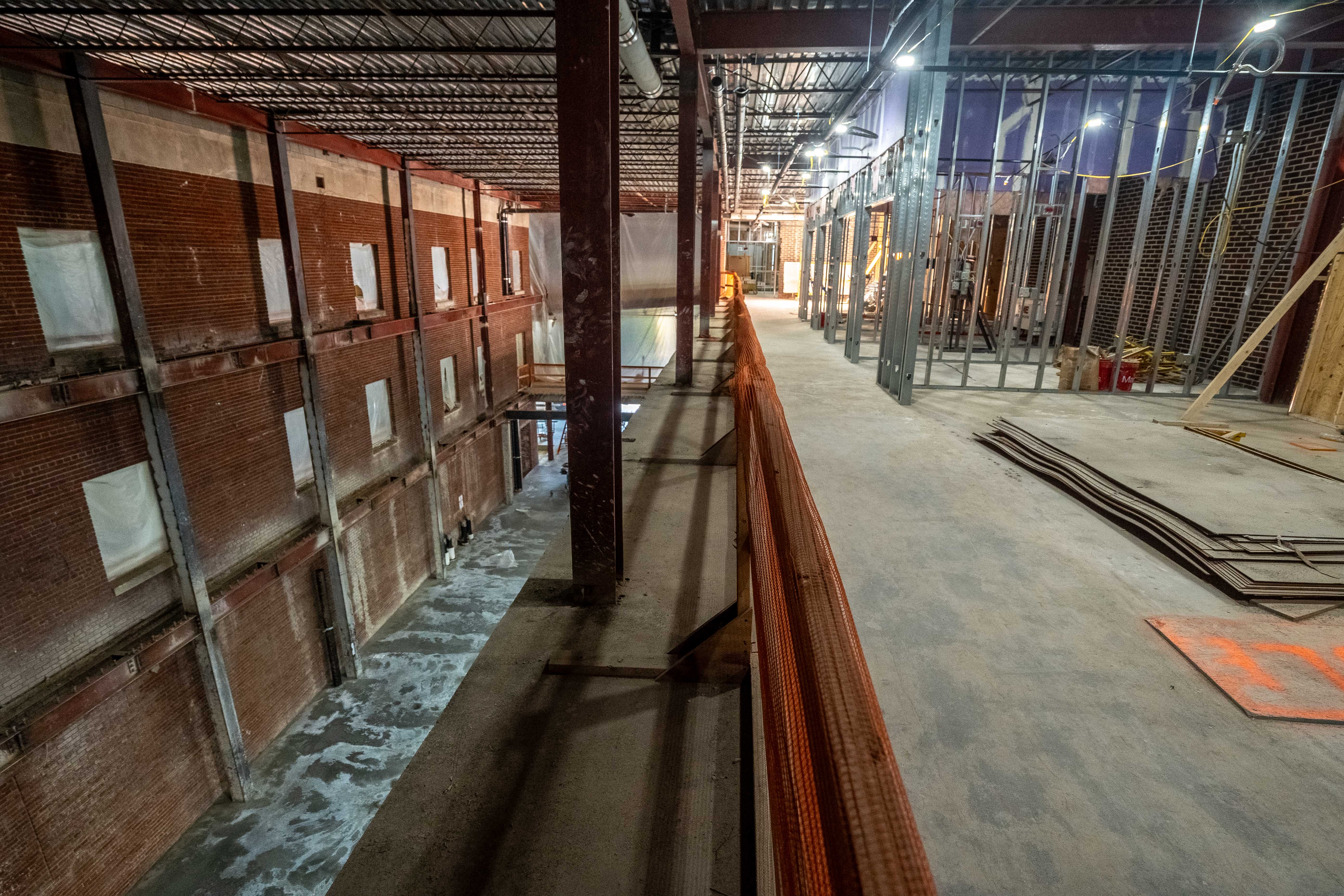A view of the community space where a three-story clear opening has been created.