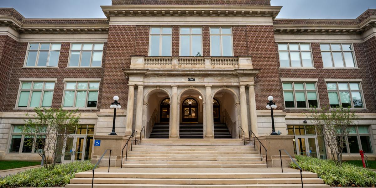 An exterior shot of Campbell Hall where the front steps can be seen. 
