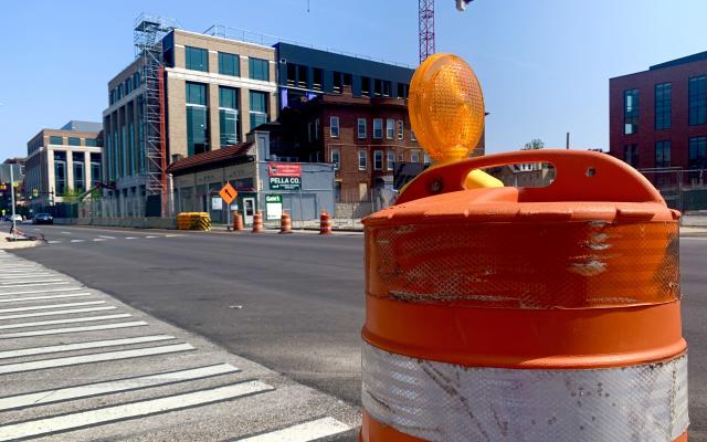 A view of a construction cone on the side of the road.