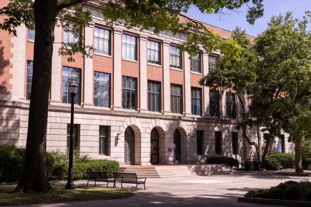 An exterior view of Bricker Hall in the summer.