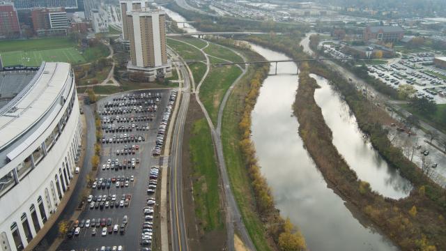 A bird's eye view of Cannon Drive. Ohio Stadium is on the left side and the river can be seen on the right.