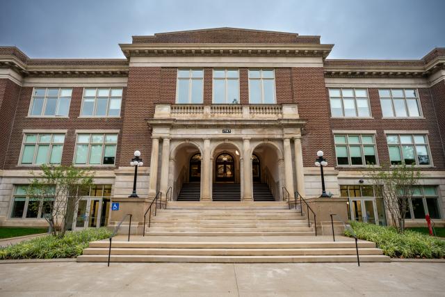 An exterior shot of Campbell Hall where the front steps can be seen.
