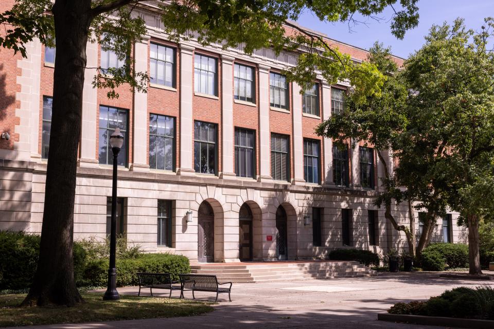 An exterior view of Bricker Hall in the summer.