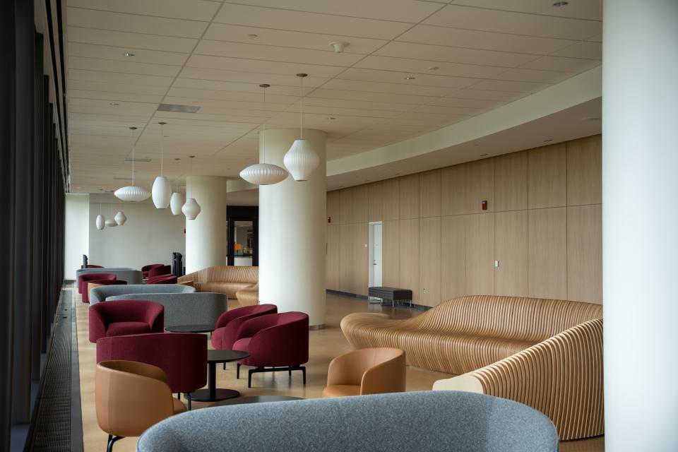 A view of a seating area with several different seating options.